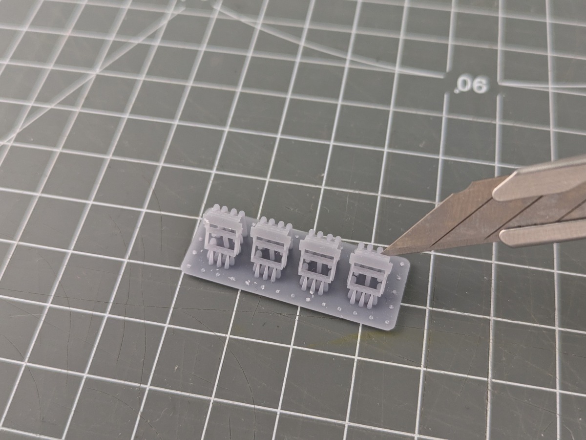 Abtrennen der Bauteile von den Supports
